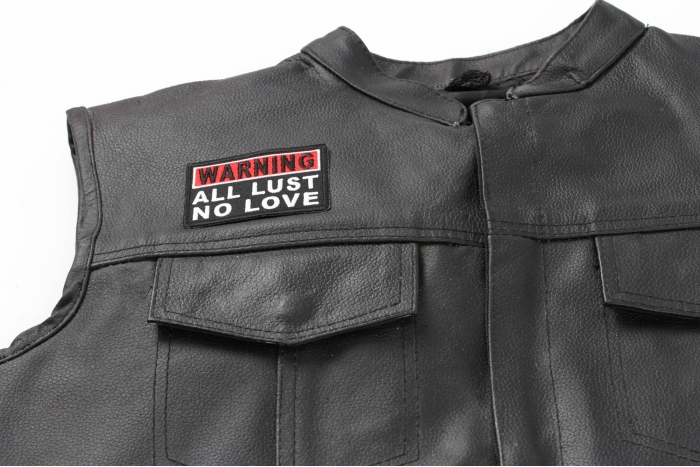 Warning All Lust No Love Patch - 3x1.5 inch. Embroidered Iron on Patch shown on leather vest