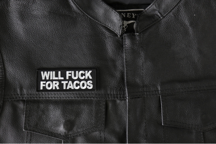Will Fuck for Tacos Patch - 4x1.5 inch - Embroidered Iron on Patch shown on leather vest