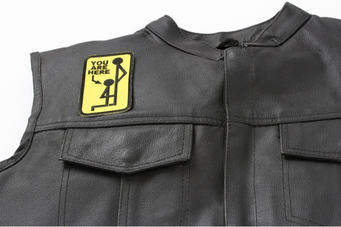 You Are Here Patch - 2.25x4 inch. Embroidered Iron on Patch shown on leather vest