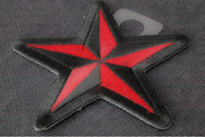 Red Black Star Novelty Iron on Patch diagonal view