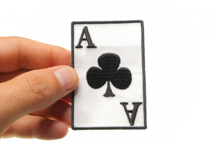 Ace Of Clubs Novelty Iron on Patch shown on hand for size comparison