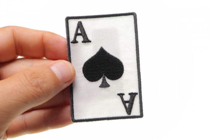 Ace Of Spades Novelty Iron on Patch shown on hand for size comparison
