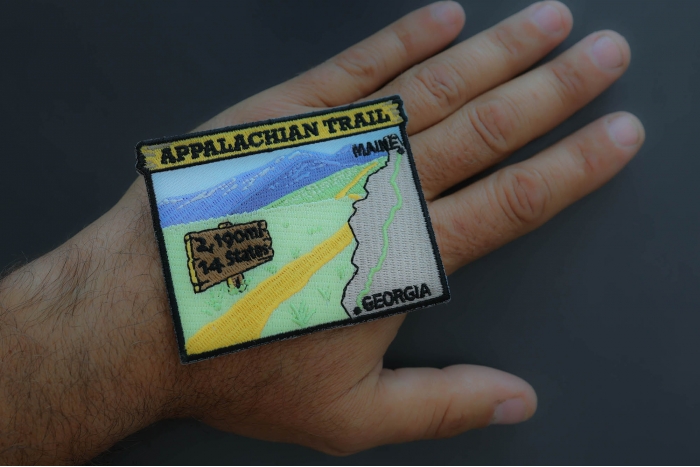 Appalachian Trail Patch shown on hand for size comparison