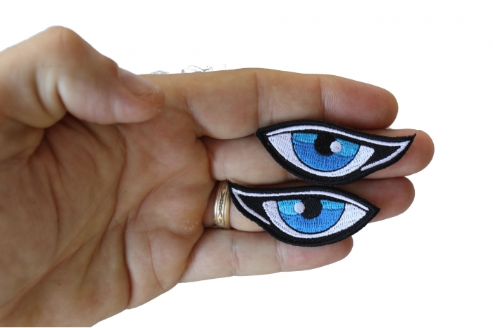 Blue Eyes Patches shown on hand for size comparison