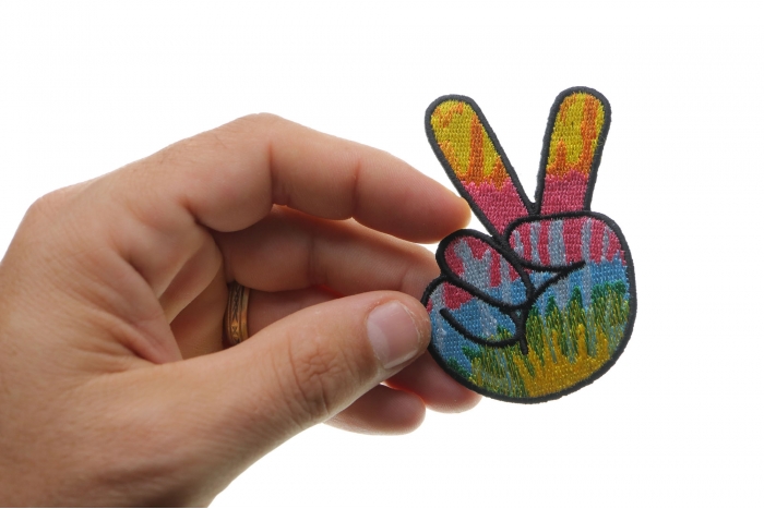 Colorful Peace Fingers Hand Sign Novelty Iron on Patch shown on hand for size comparison