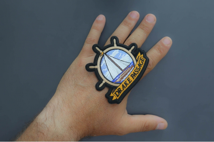 Drake Passage Patch shown on hand for size comparison