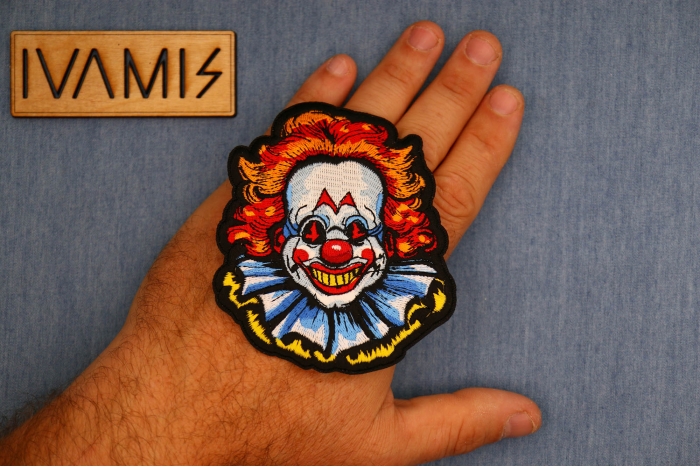 Fat Clown Patch shown on hand for size comparison