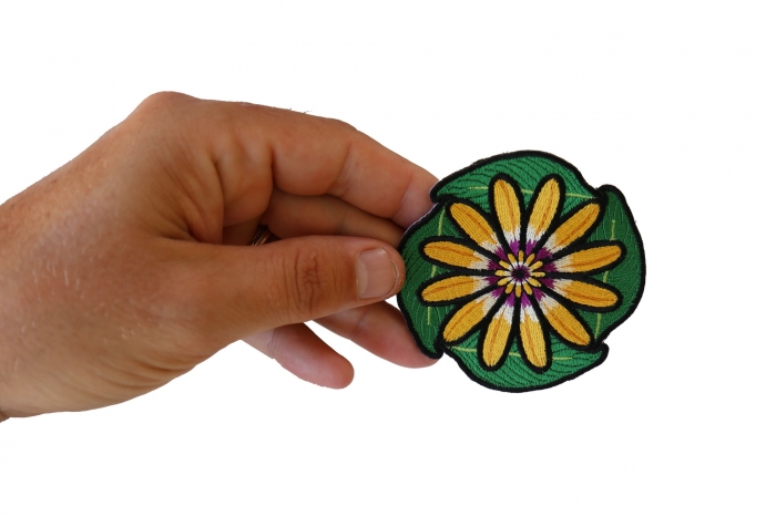 Flowers and Leaves Iron on Patch shown on hand for size comparison
