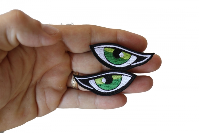 Green Eyes Patch shown on hand for size comparison