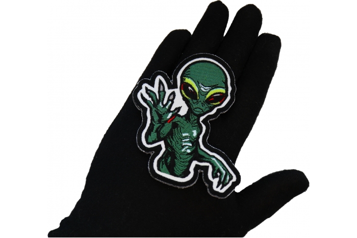 Hi Five Alien Patch shown on hand for size comparison
