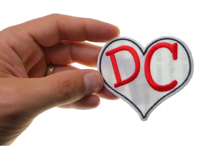 I Love DC Heart Novelty Iron on Patch shown on hand for size comparison