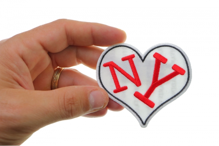  shown on hand for size comparison