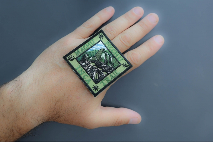 Machu Pichu Inca Trail Patch shown on hand for size comparison