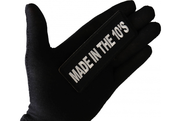 Made in the 10's Patch shown on hand for size comparison