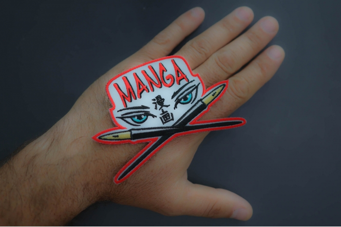 Manga Japanese Comic Book Culture Patch shown on hand for size comparison