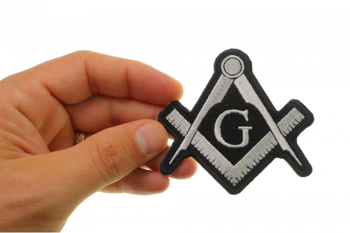 Mason Sign White Novelty Iron on Patch shown on hand for size comparison