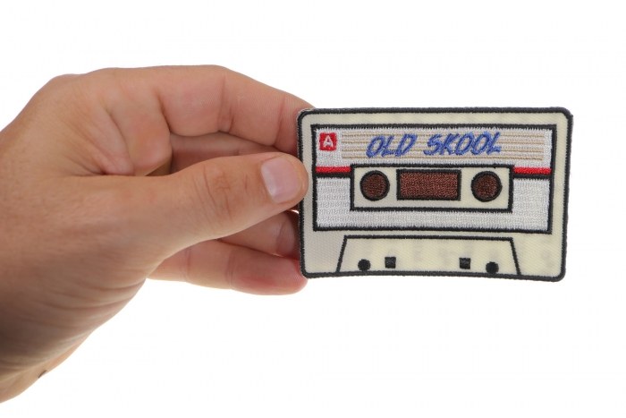 Old Skool Radio Cassette Novelty Iron on Patch shown on hand for size comparison