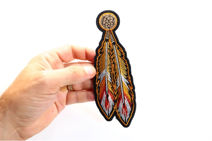 Feather Patch, Small Embroidered Sew on Patches for Leather Biker Vests shown on hand for size comparison