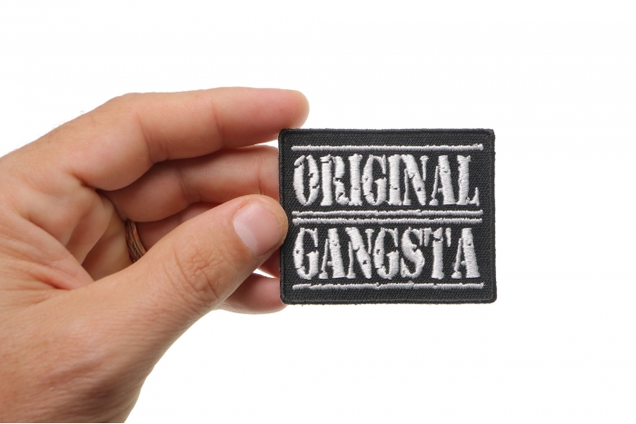 Original Gangsta Patch shown on hand for size comparison