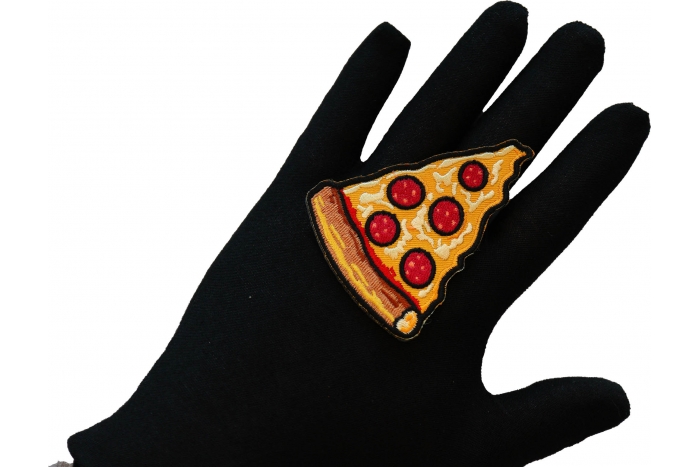 Pizza Slice Iron on Patch shown on hand for size comparison