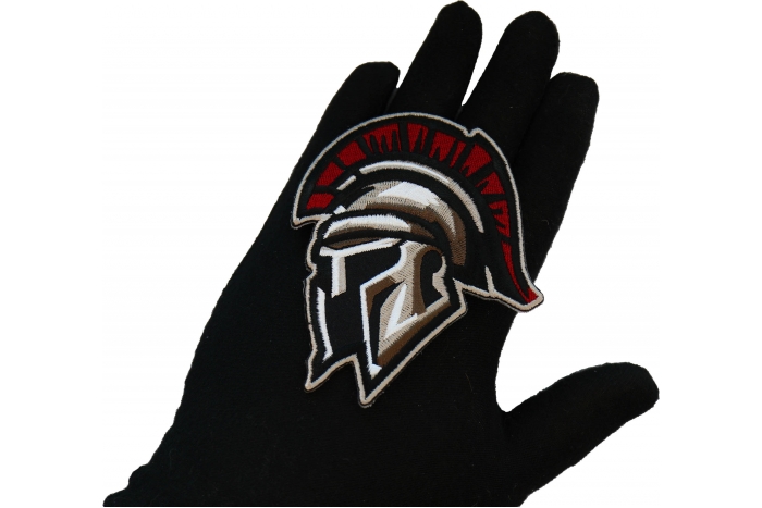 Spartan Helmet Patch shown on hand for size comparison