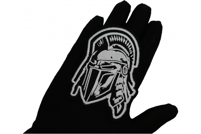 Spartan Helmet Patch shown on hand for size comparison
