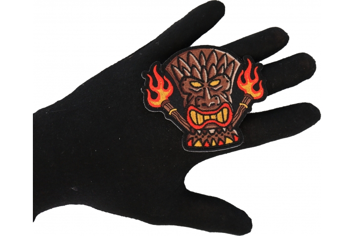 Tiki Totem Iron on Patch shown on hand for size comparison