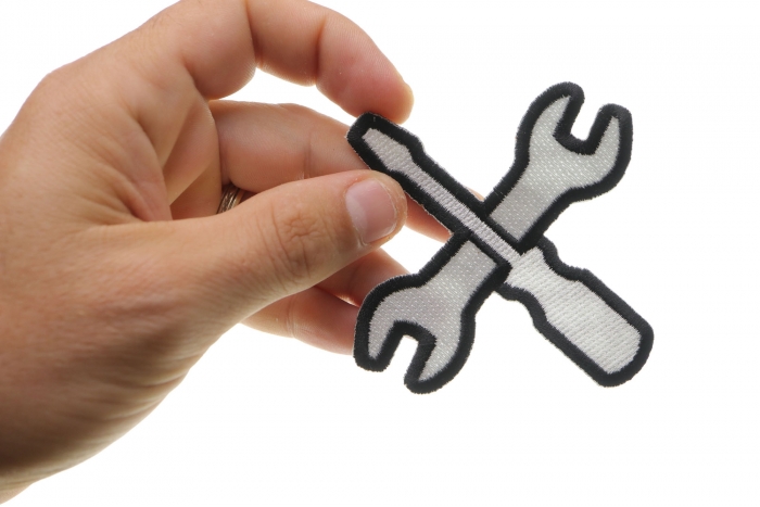Wrench and Screwdriver Iron on Novelty Iron on Patch shown on hand for size comparison