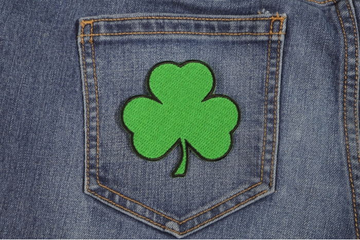3 Leaf Clover Shamrock Novelty Iron on Patch shown on jeans