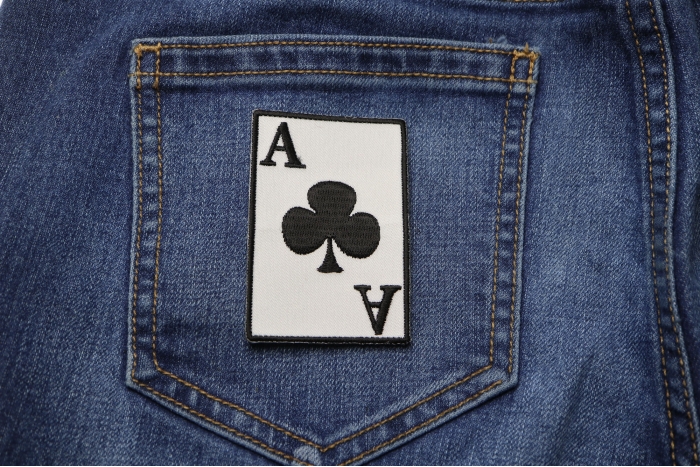 Ace Of Clubs Novelty Iron on Patch shown on jeans