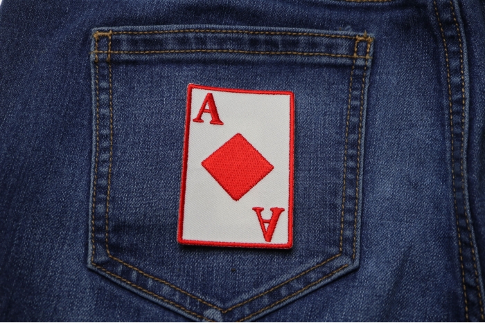 Ace Of Diamonds Novelty Iron on Patch shown on jeans