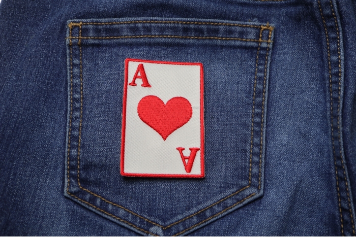 Ace Of Hearts Novelty Iron on Patch shown on jeans