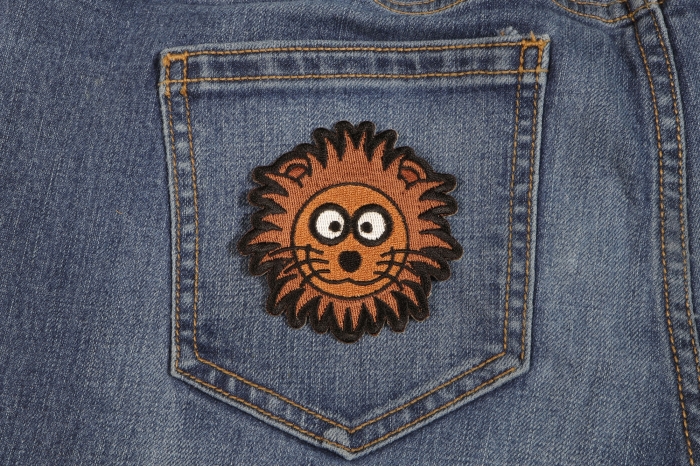 Brown Lion Head Patch shown on jeans