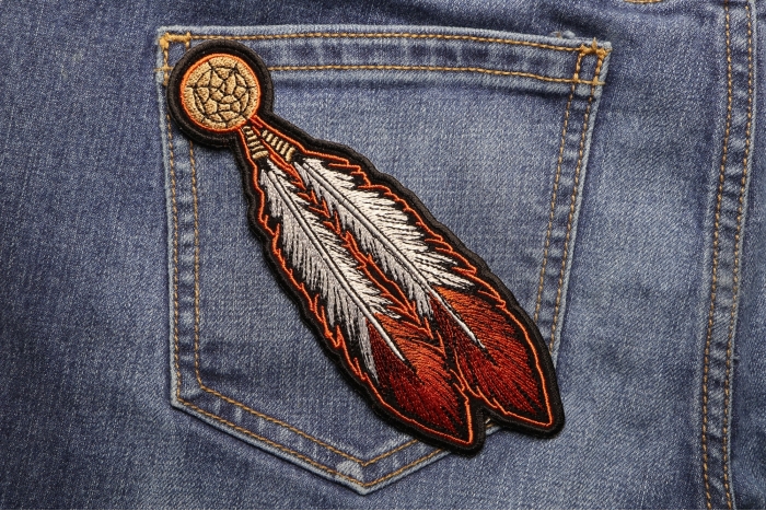 Brown White Feathers Patch shown on jeans