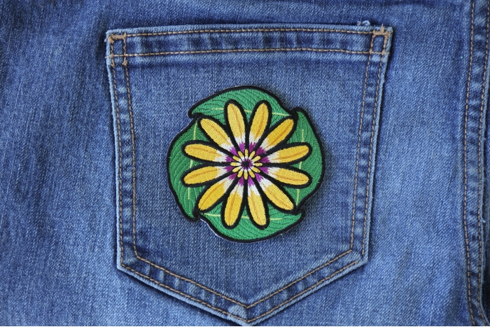 Flowers and Leaves Iron on Patch shown on jeans