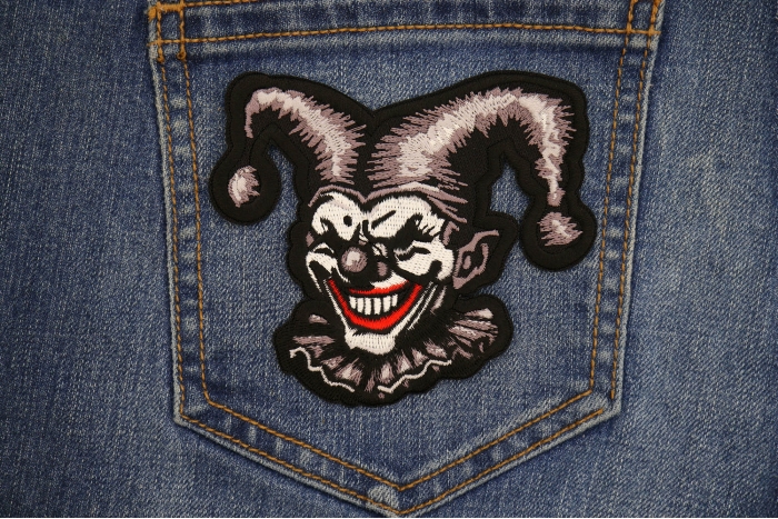 Gray Clown Patch shown on jeans