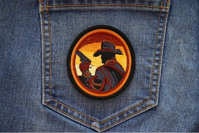 Gun Slinger Patch shown on jeans