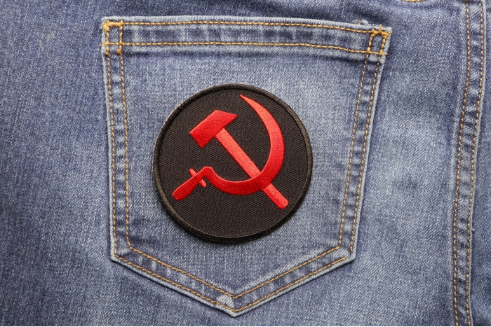 Hammer and Sickle Iron on Novelty Patch shown on jeans