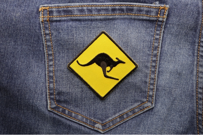 Kangaroo Sign Patch Yellow and Black shown on jeans