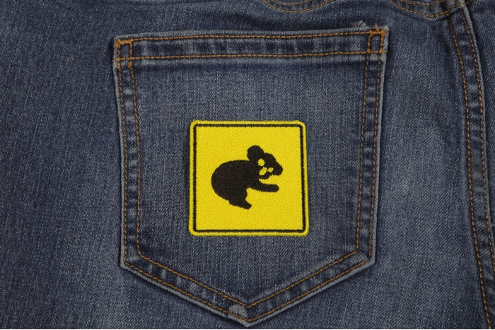 Koala Sign Iron On Patch shown on jeans