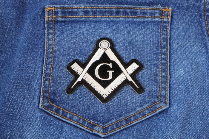 Mason Sign White Novelty Iron on Patch shown on jeans