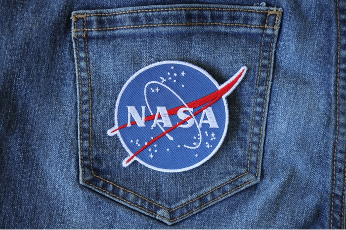 NASA logo Novelty Iron on Patch shown on jeans