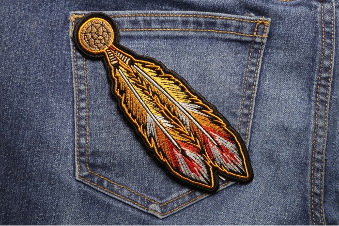 Orange Feathers Patch shown on jeans