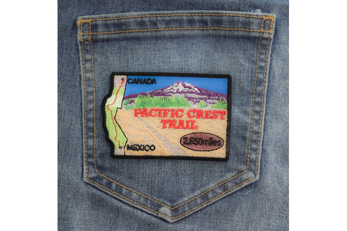 Pacific Crest Trail Patch shown on jeans