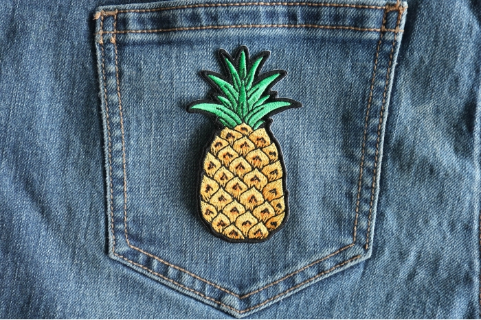 Pineapple Patch shown on jeans