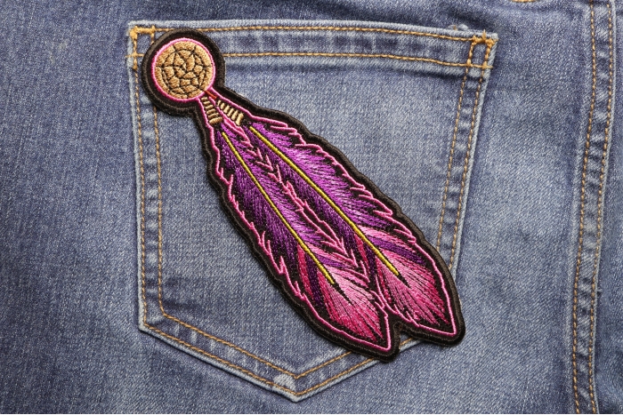 Pink Purple Feathers Patch shown on jeans