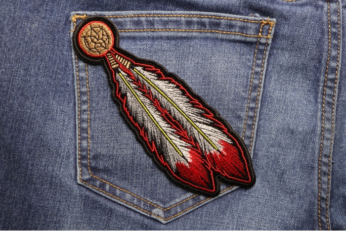 Red White Feathers Patch shown on jeans