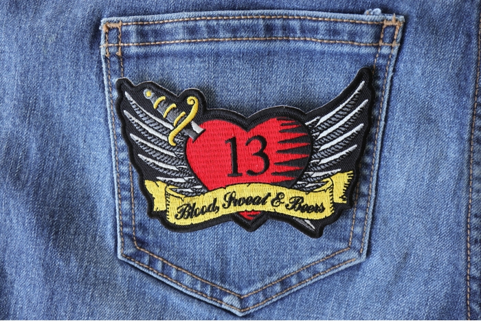 Blood Sweat and Beers Funny Iron on Patch with Heart and Wings shown on jeans