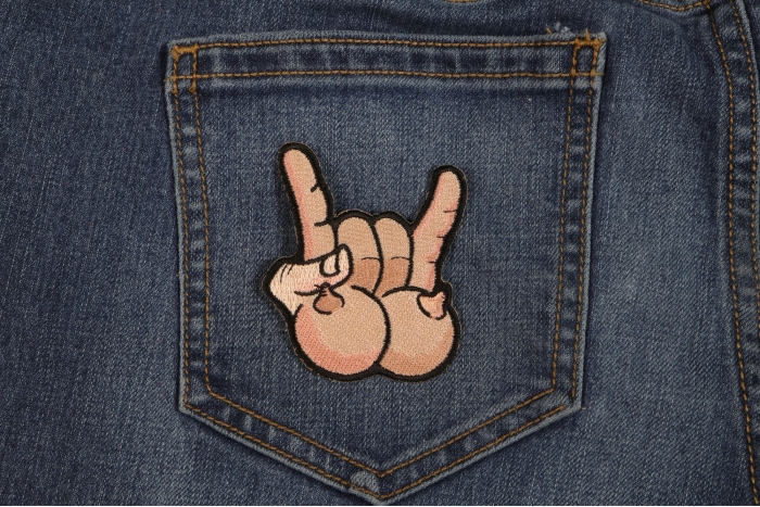Tits and Rock On Fun Iron On Novelty Patch shown on jeans