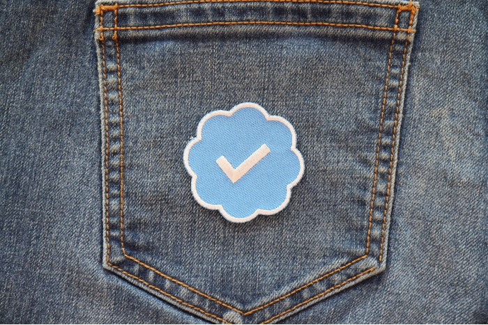 Twitter verified Patch shown on jeans
